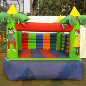 Colorful castle-themed bounce house for children’s play