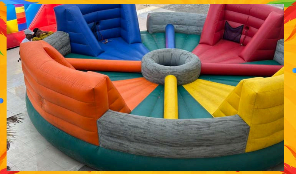 Inflatable bungee run game with lanes and safety straps