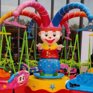 Colorful Joker-themed swing ride for children
